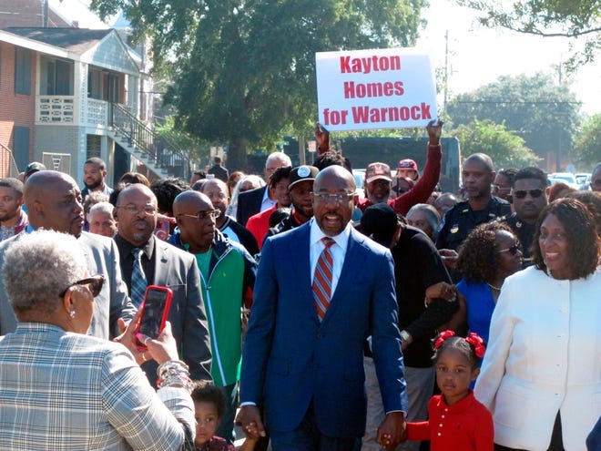 Sen. Raphael Warnock, D-Ga., during a ceremony naming a street in his honor in his hometown of Savannah on Oct. 6, 2022.