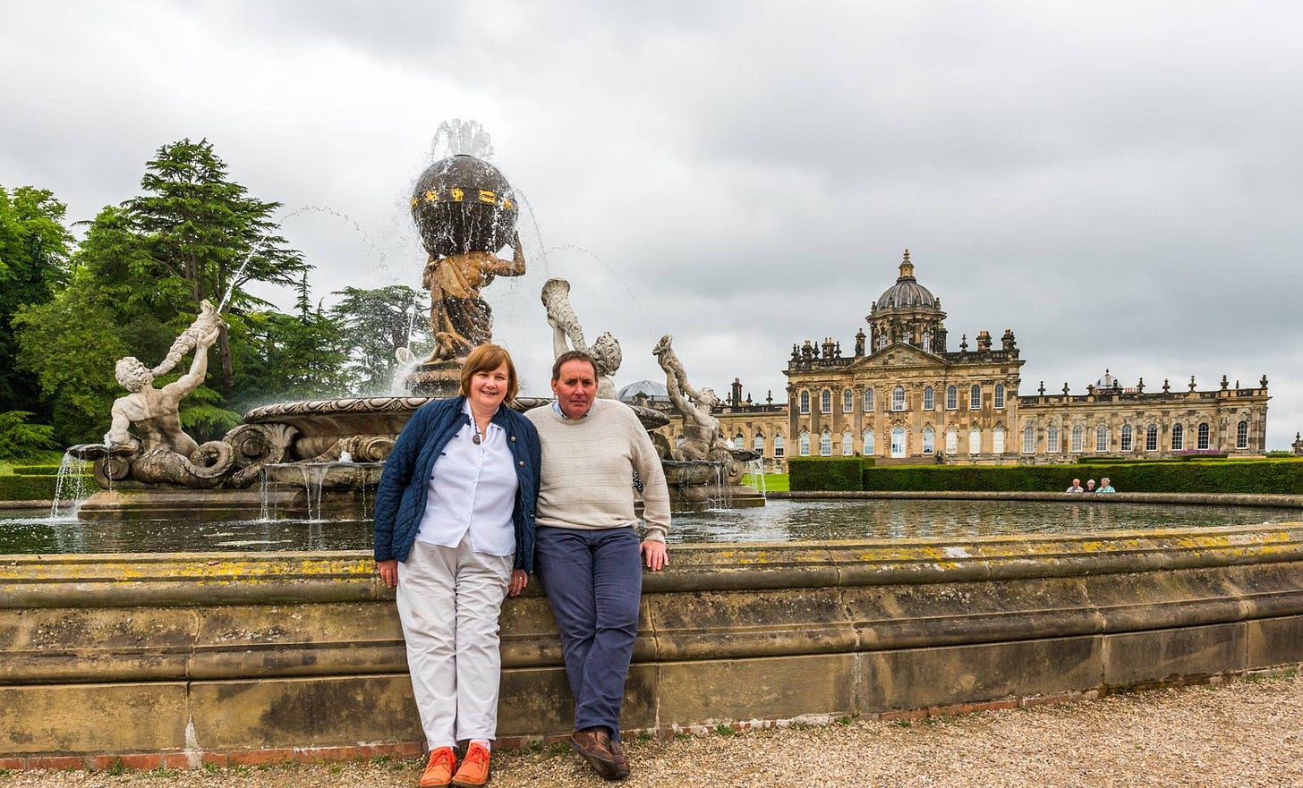 My parents stood outside a fountain in the grounds of Castle Howard, a stately home in North Yorkshire, United Kingdom.