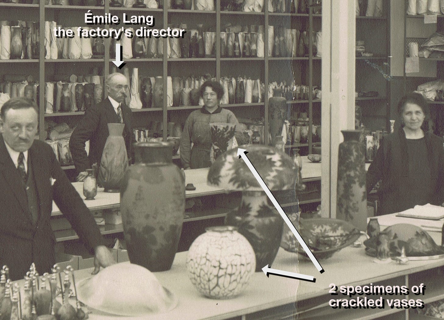 Two crackled vases (one partially hidden by an Algae vase and a Peony lamp) in the packaging room of the factory in May 1927, private collection.