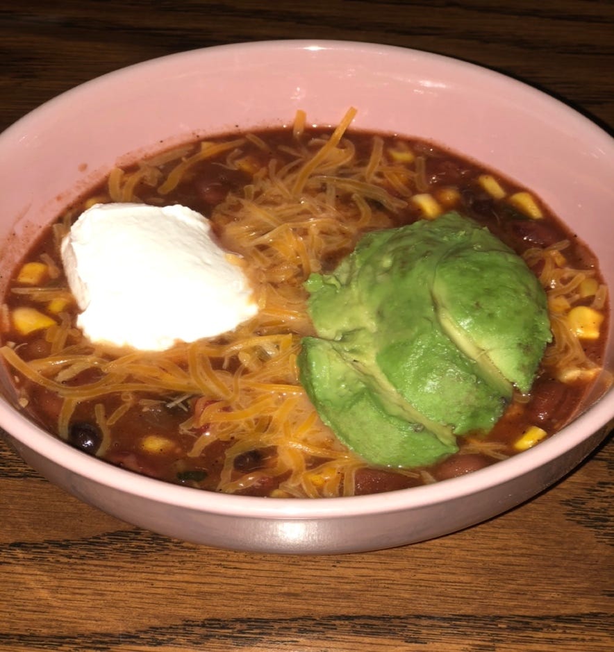 A bowl of food

Description automatically generated with medium confidence