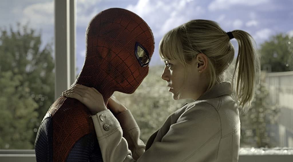 Andrew Garfield with Emma Stone, who is known for being a redhead, but who is actually blonde, and who is blonde here because canon. (Photo by Sony/Marvel)