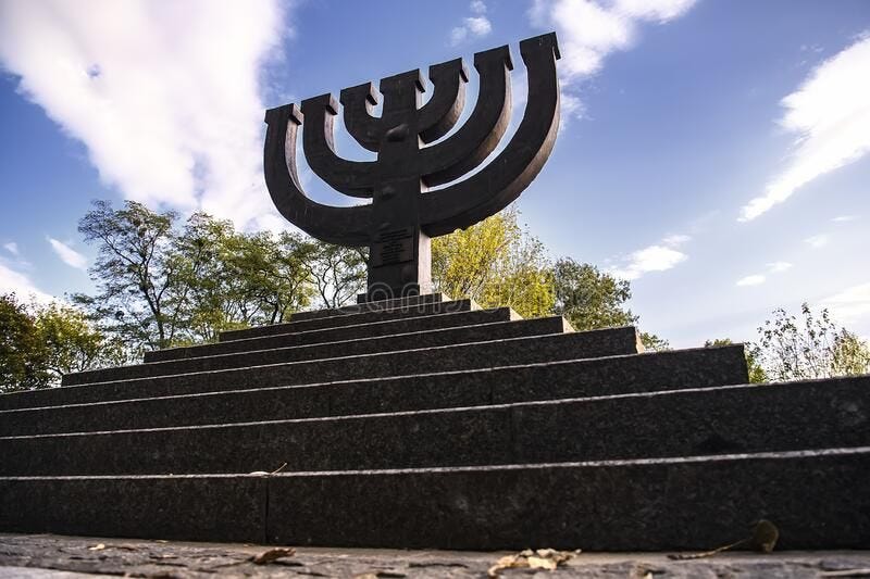 A Menorah Memorial Dedicated To Jewish People Executed In ...