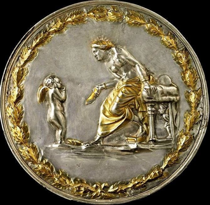 Mixed metals in silver and gold portraying a contrite small Eros before his mother Aphrodite, who is reproaching him with a slipper in her hand.