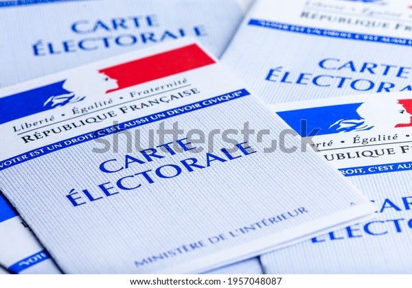 Clamart, France - April 16, 2021: French electoral cards. Each French voter receives a card allowing them to vote in elections in France