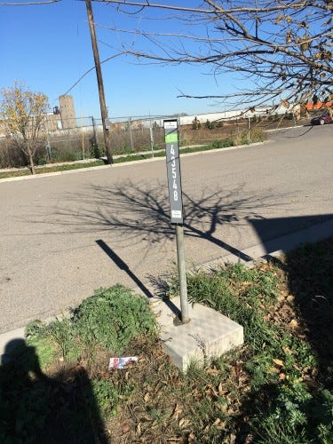 A lonely paid parking spot on 25th Avenue SE near its termination. 