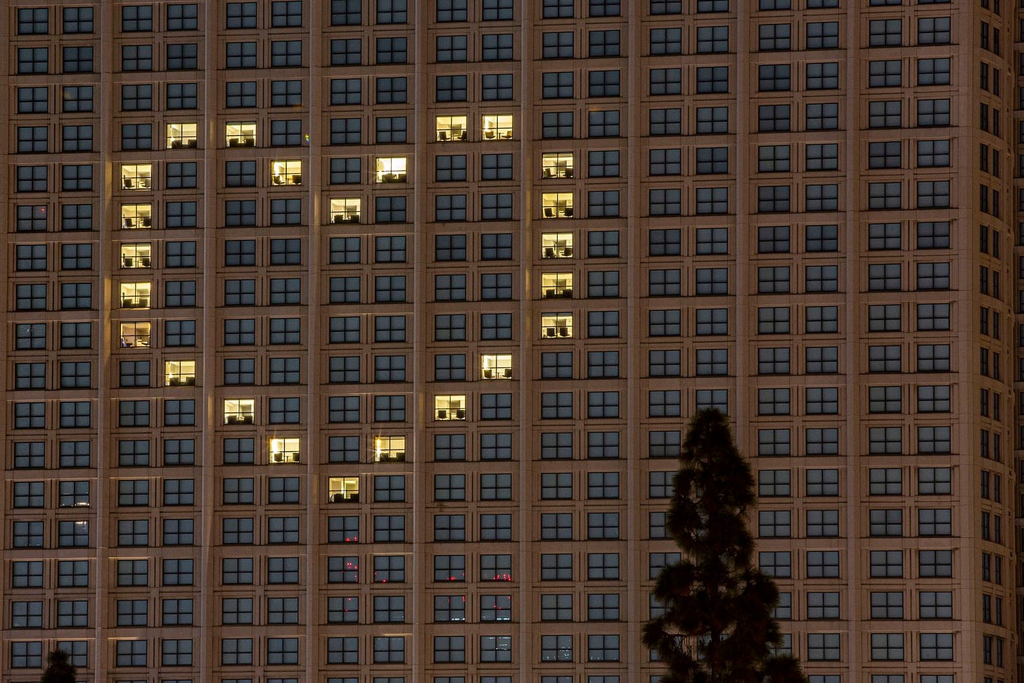 Room lights from the Manchester Grand Hyatt hotel form a heart in San Diego, California, on April 16, 2020.