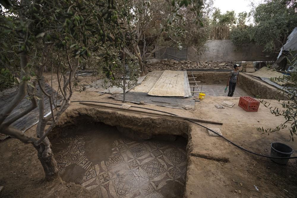 A view of parts of a Byzantine-era mosaic floor that was uncovered recently by a Palestinian farmer in Bureij in central Gaza Strip, Sept. 5, 2022. The man says he stumbled upon it while planting an olive tree last spring and quietly excavated it over several months with his son. Experts say the discovery of the mosaic — which includes 17 well-preserved images of animals and birds — is one of Gaza's greatest archaeological treasures. They say it's drawing attention to the need to protect Gaza's antiquities, which are threatened by a lack of resources and the constant threat of fighting with Israel. (AP Photo/Fatima Shbair)