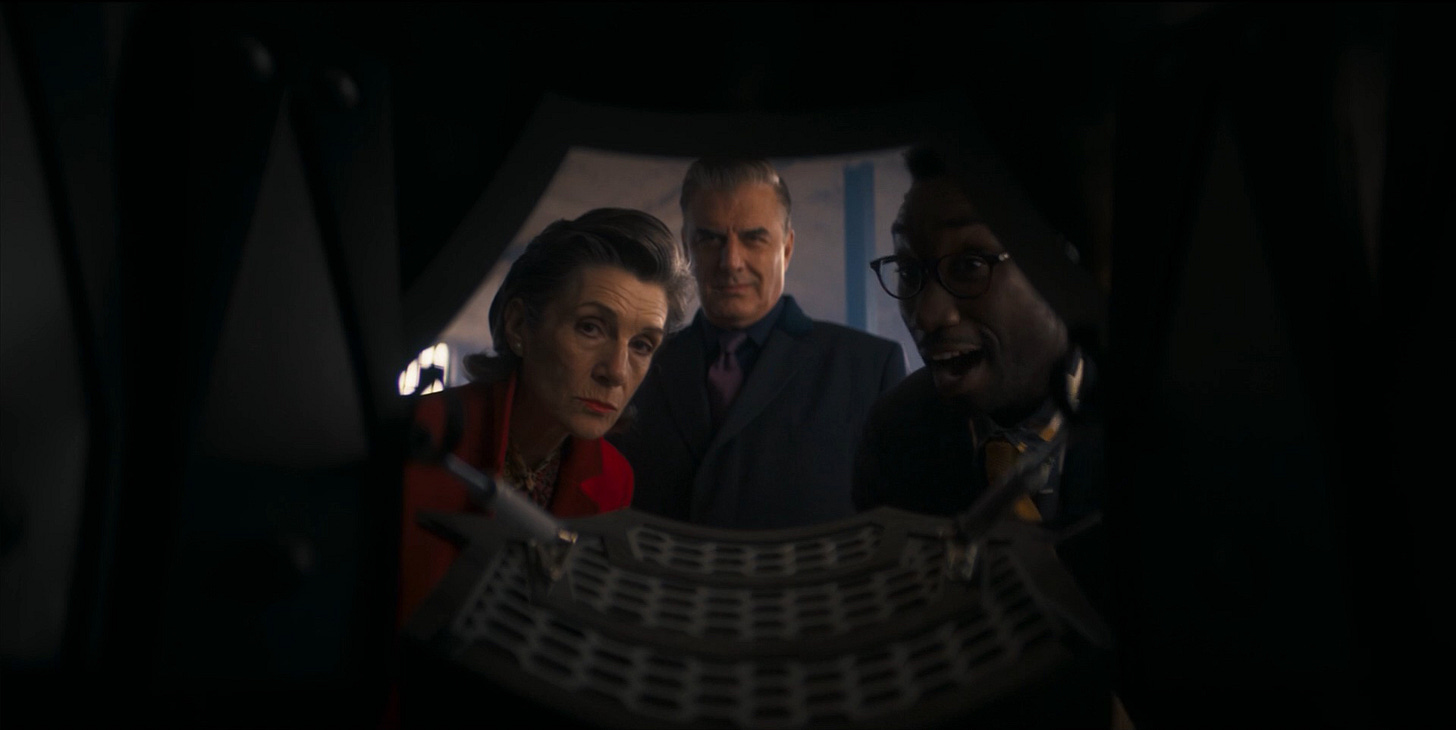 This image shows, from left to right, British Technology Secretary Jo Patterson (played by Harriet Walter), financier Jack Robertson (played by Chris Noth), and tech genius Leo Rugazzi (played by Nathan Stewart-Jarrett) as they examine the innards of a Dalek "defence drone" that Leo has developed for commercial use. This image shows, from left to right, British Technology Secretary Jo Patterson (played by Harriet Walter), financier Jack Robertson (played by Chris Noth), and tech genius Leo Rugazzi (played by Nathan Stewart-Jarrett) as they examine the innards of a Dalek "defence drone" that Leo has developed for commercial use.
