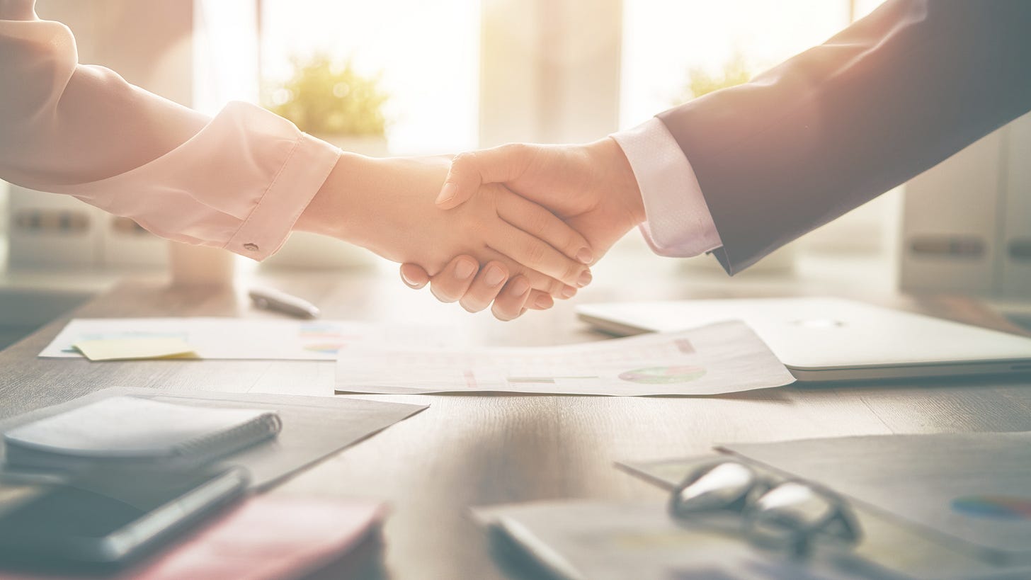 handshaking between a man and a lady