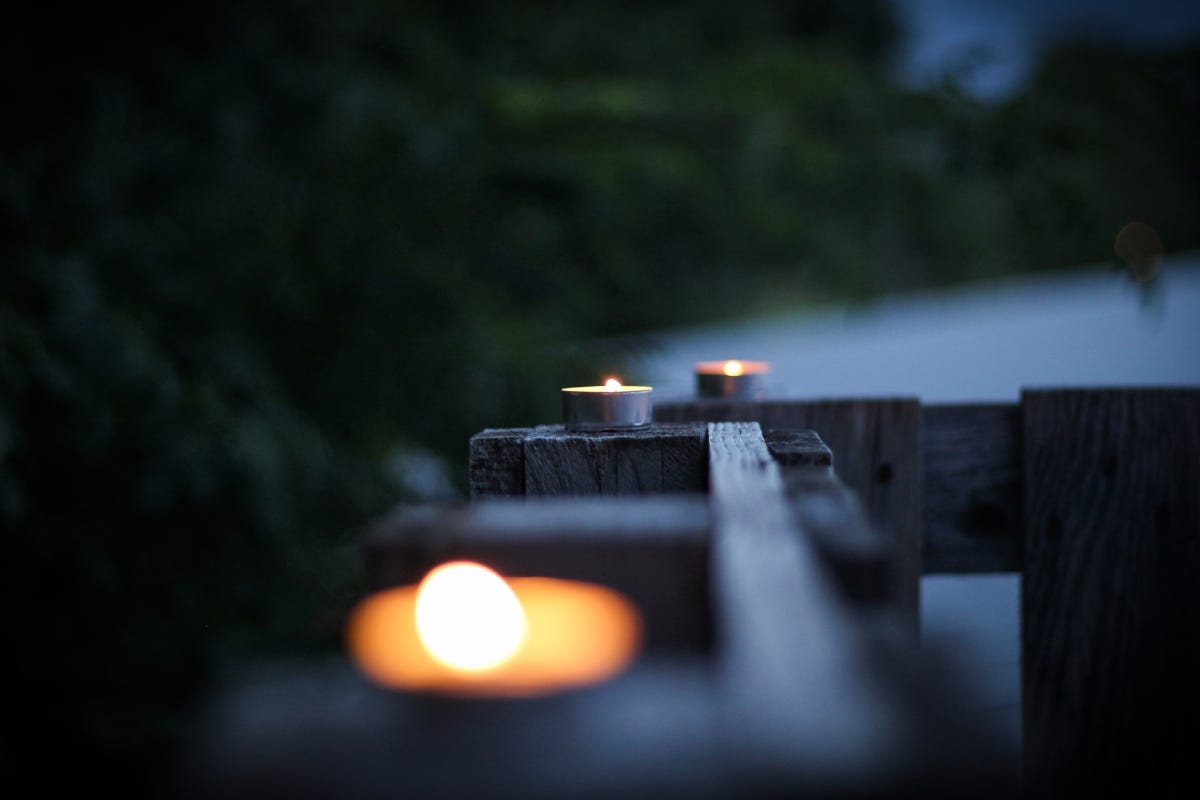 candles burning outdoors
