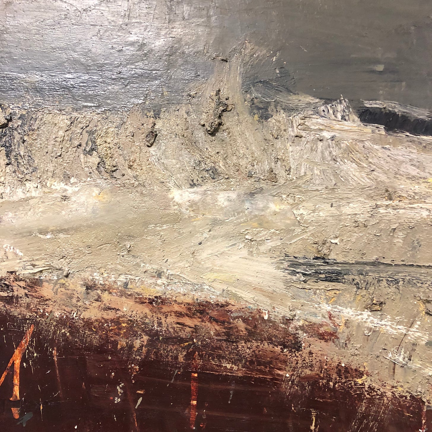 A closeup of a Joan Eardley painting of a storm: rough, impasto, palette-knived paint, a matte grey, a warm brown and muddy whites in between. 