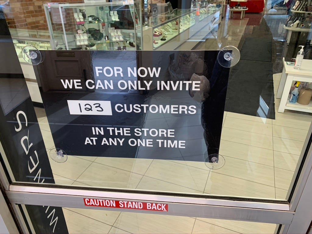 Sign at a Winners: Only 123 customers allowed at one time.