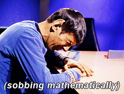 A Star Trek scene in which Spock is crying at his desk, captioned "(sobbing mathematically)."  This is from season 1, episode 4 of The Original Series (TOS), called The Naked Time.