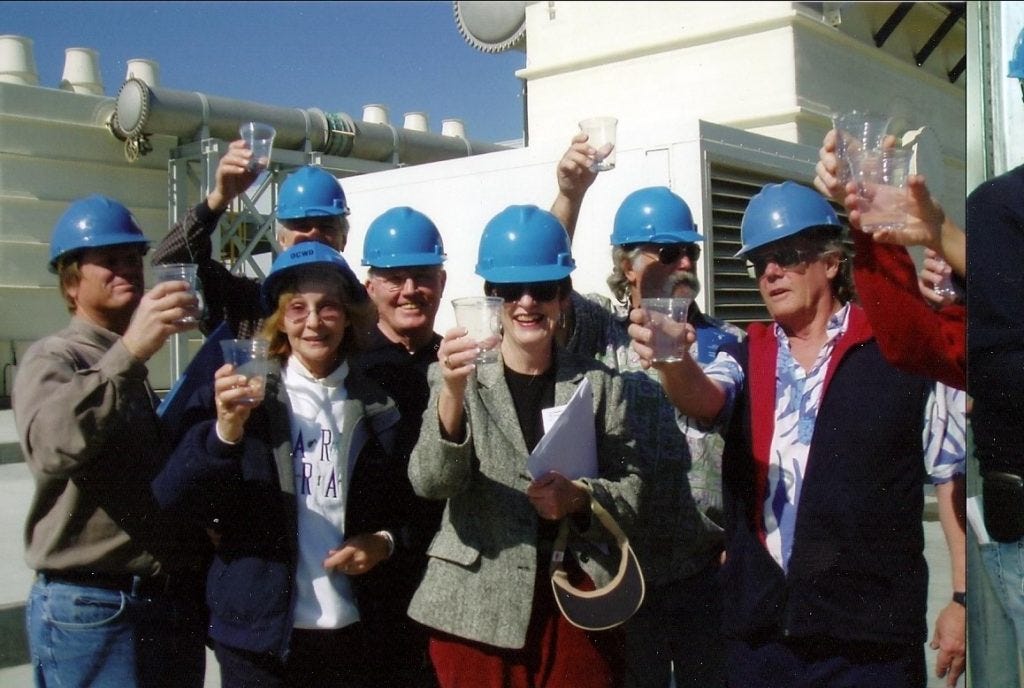 Visitors enjoy a refreshing drink of fully treated and delicious sewer water.