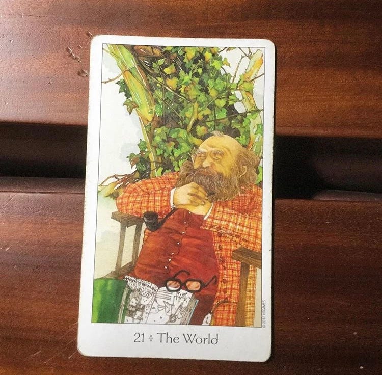 The World is my favorite card of the deck. It signals a feeling of completion and happiness