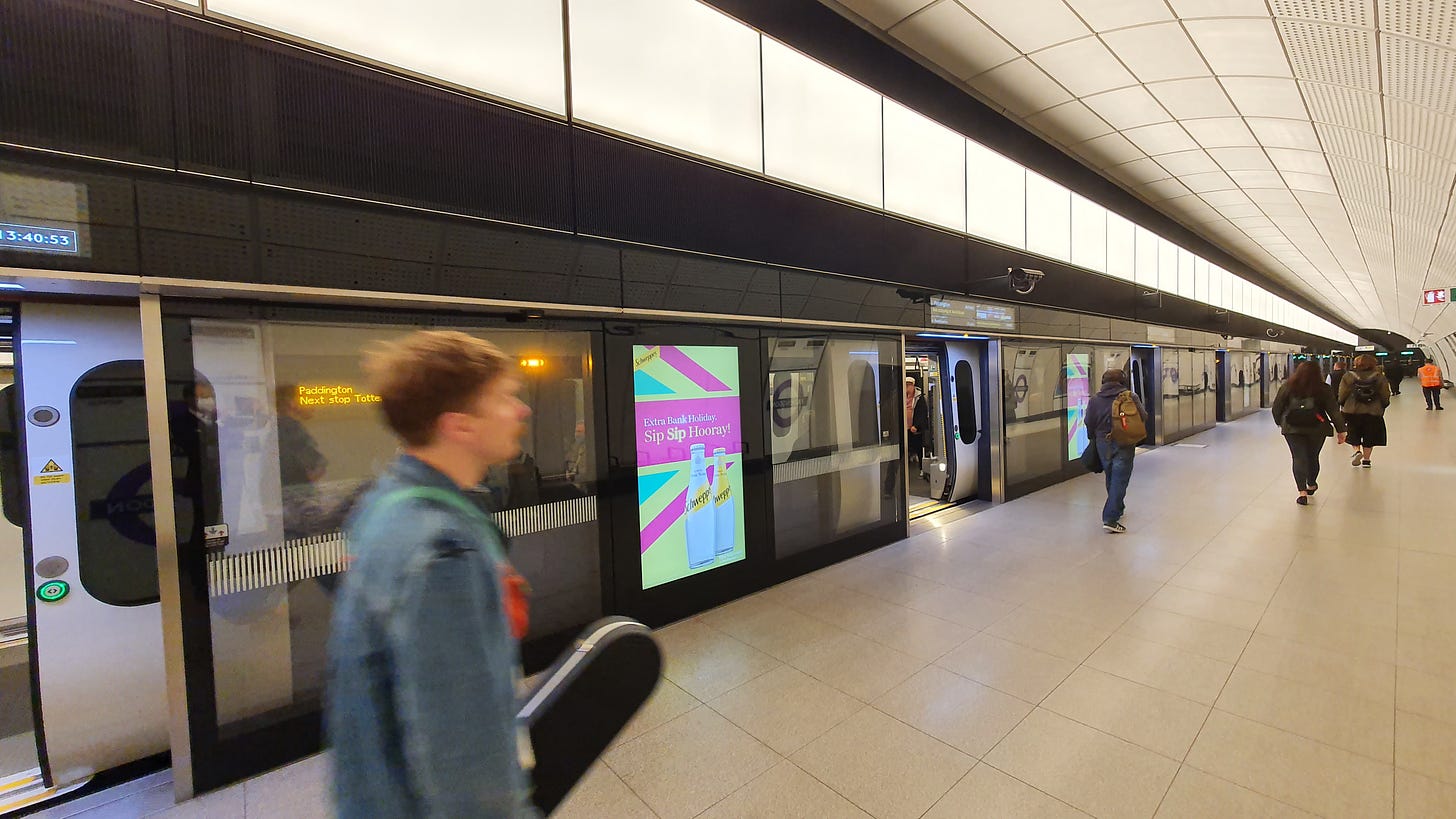 An image of an underground Elizabeth line platform with the train doors open
