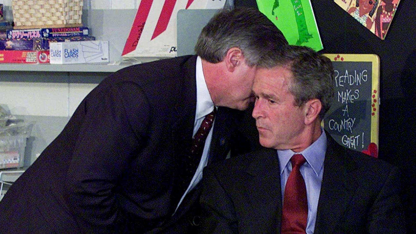 President George Bush reacts when told of a possible terrorist attack in NYC