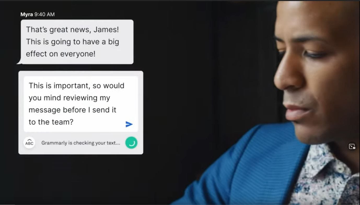James replied ‘This is important, so would you mind reviewing my message before I sent it to the team?” Grammarly is checking the text. The blazer is awful.