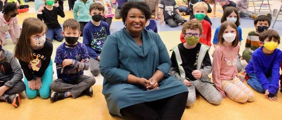 Stacey Abrams Campaign Scrambles To Do Damage Control Following Maskless  Image With Children | The Daily Caller