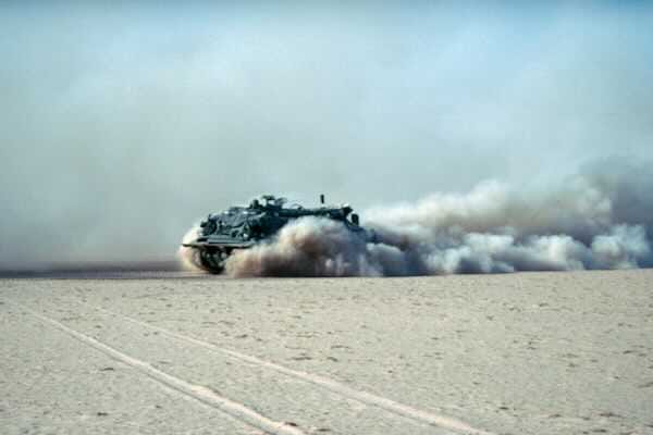 M88 recovery vehicle with dust plume
