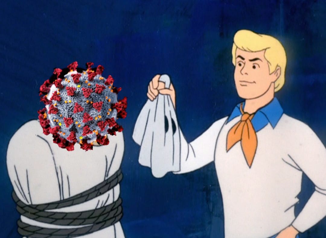  Cartoon shows Fred from Scooby Doo Mysteries has ripped a ghost mask sheet off the villain to reveal the head of the villain is a coronavirus