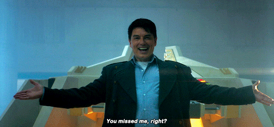 This GIF (repeated moving image) shows Captain Jack Harkness (played by John Barrowman) standing inside a stolen alien spacecraft while repeating the words, "You missed me, right?" again and again.