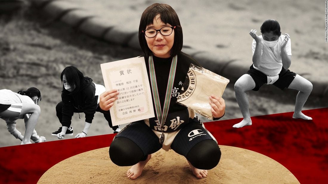 Senna Kajiwara (center) started practicing sumo when she was eight years old. 