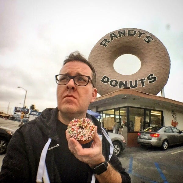 Pictured: Author consumes VERY* healthy donut  (*don't check)