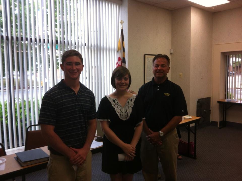 The 2012 WCRC Scholarship winners pose with club president Larry Dodd.