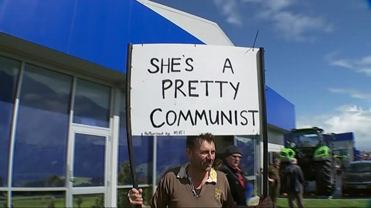 Jacinda Ardern laughs off 'pretty communist' protest sign | Newshub