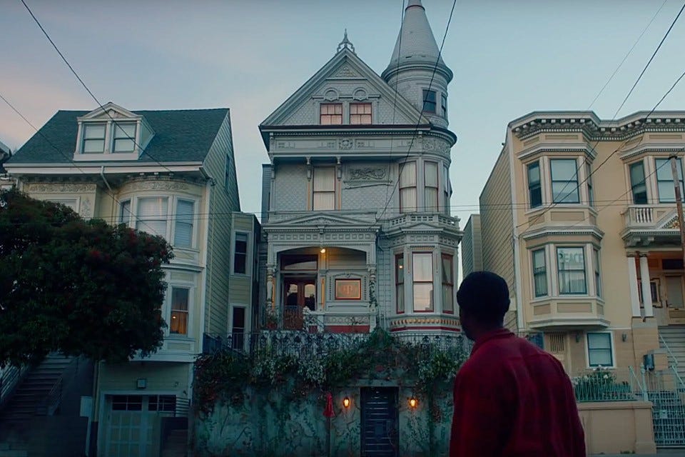 A still image from the movie The Last Black Man in San Francisco, showing a Victorian house in the middle.
