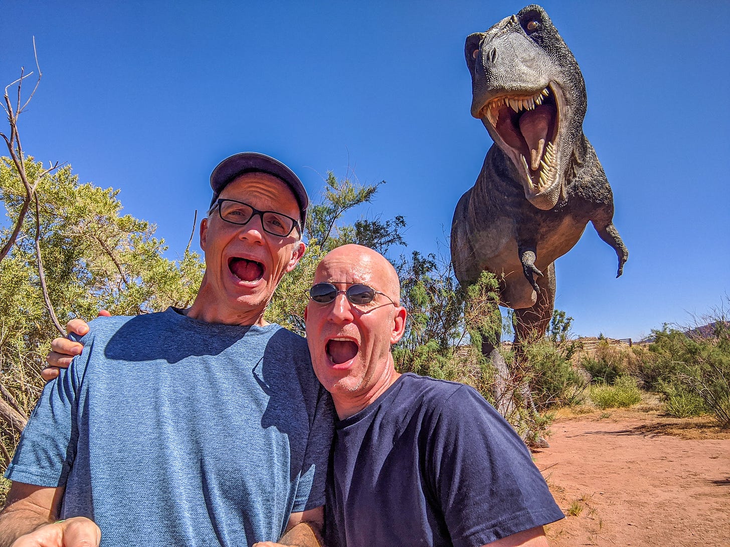 Brent and Michael being chased by a dinosaur!