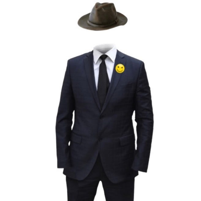 Empty suit with fedora and smiley pin