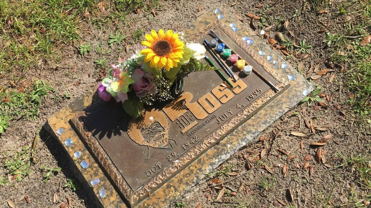 Bob Ross' gravestone with flowers 