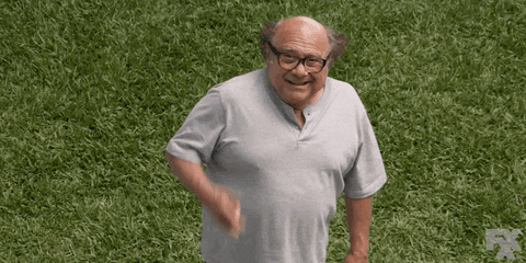 Danny DeVito point and saying "That's lit".