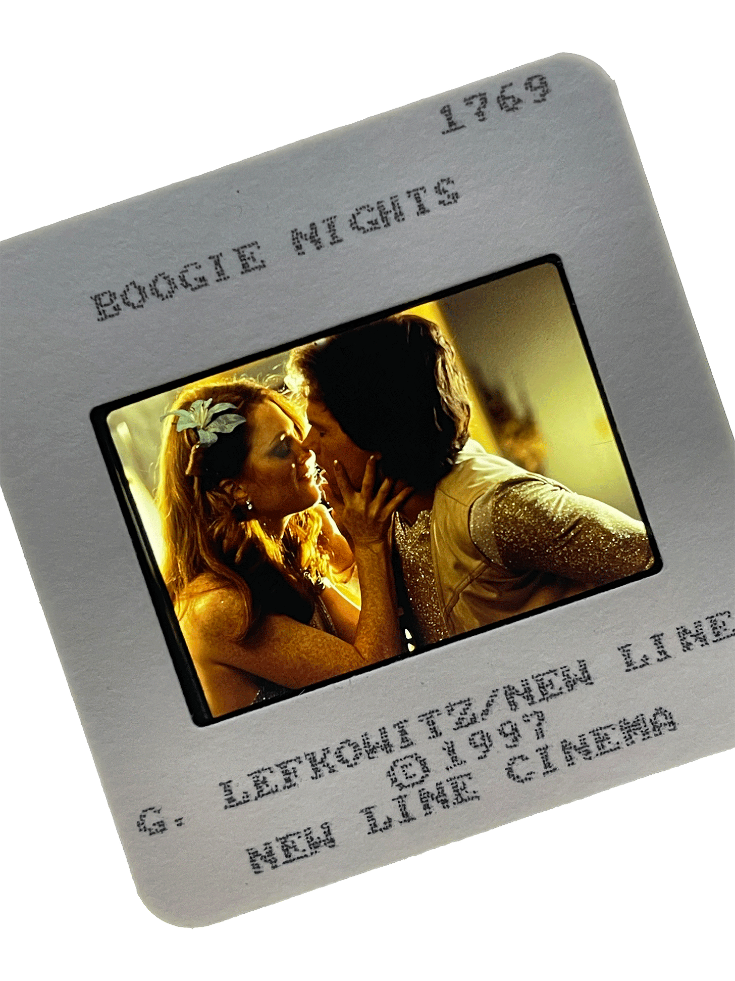 Slide from BOOGIE NIGHTS with Julianne Moore and Mark Whalberg, photo by G. Lefkowitz.