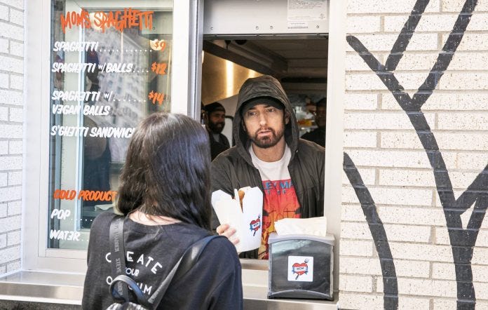 Eminem surprises fans at opening of Mom&#39;s Spaghetti restaurant in Detroit