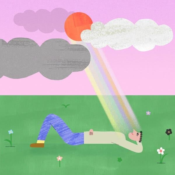 An illustration of a person lying on green grass, basking in the rays of a rainbow. In the pink sky is an orange sun and gray and white fluffy clouds.
