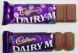 Shrinkflation used by Cadbury to literally cut corners. The bottom  chocolate bar is more than 8 percent smaller : assholedesign