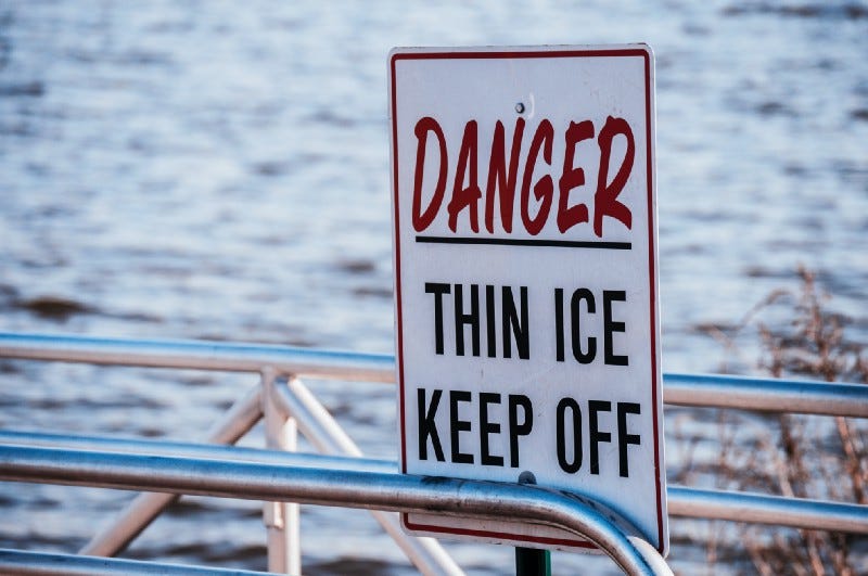 A sign: Danger: Thin Ice, Keep Off