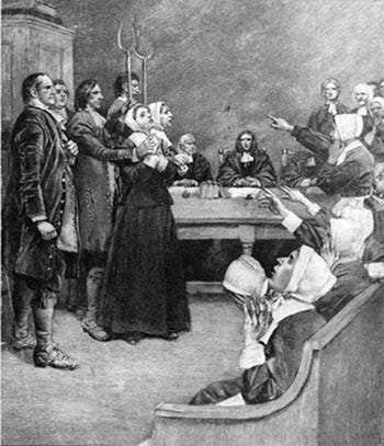 Salem witch trials: accused witches look fearful as their accusers frantically point and cry