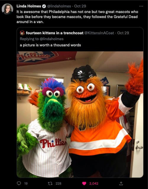 Tweet from Twitter user @LindaHolmes that reads "It is awesome that Philadelphia has not one but two great mascots who look like before they became mascots, they followed the Grateful Dead around in a van." over a picture of Gritty and the Philly Phanatic