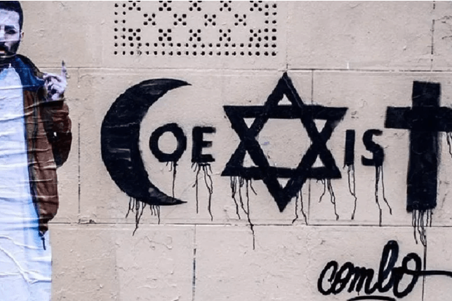 Combo coexist graffiti on a wall