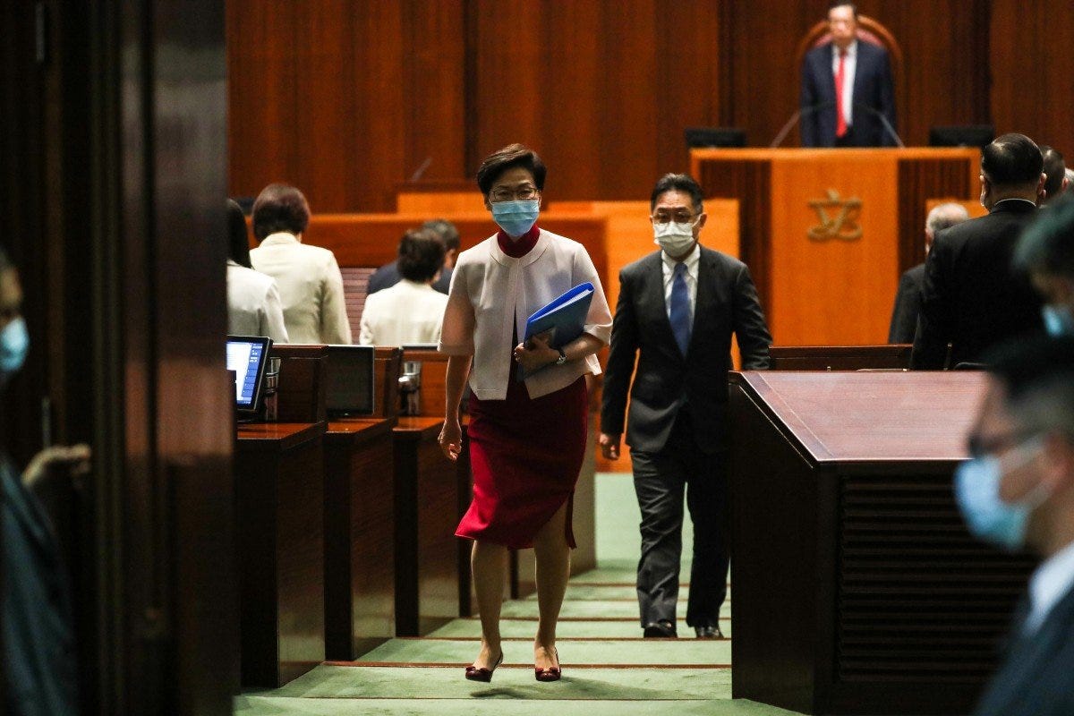 Hong Kong leader Carrie Lam leaves the Legco chamber after delivering her final policy address of her term. Photo: Sam Tsang Hong Kong leader Carrie Lam leaves the Legco chamber after delivering her final policy address of her term. Photo: Sam Tsang