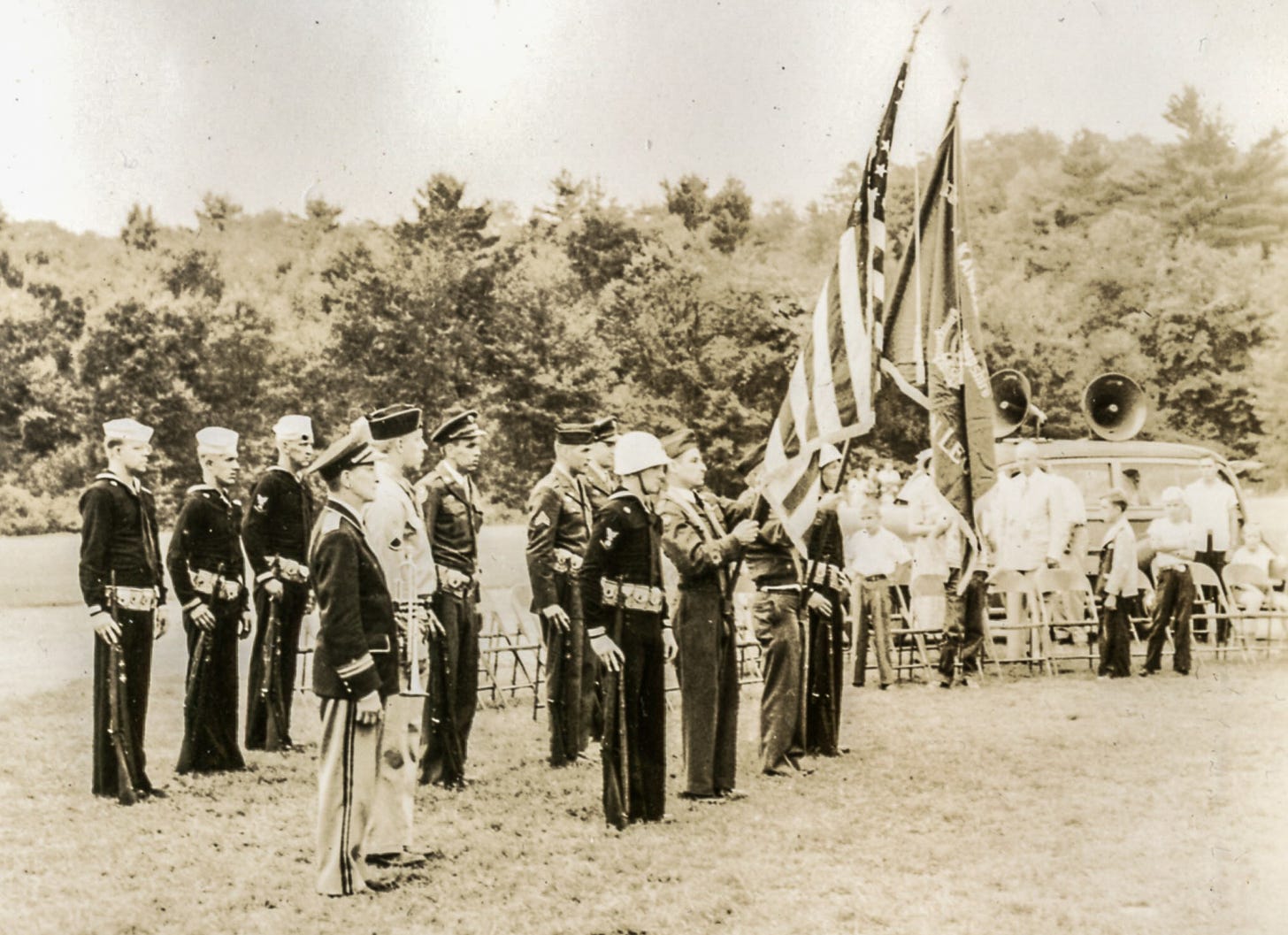 Men in uniform standing at attention