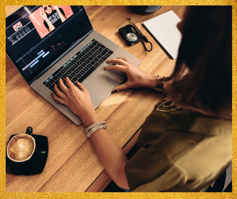 A women intensely editing a document