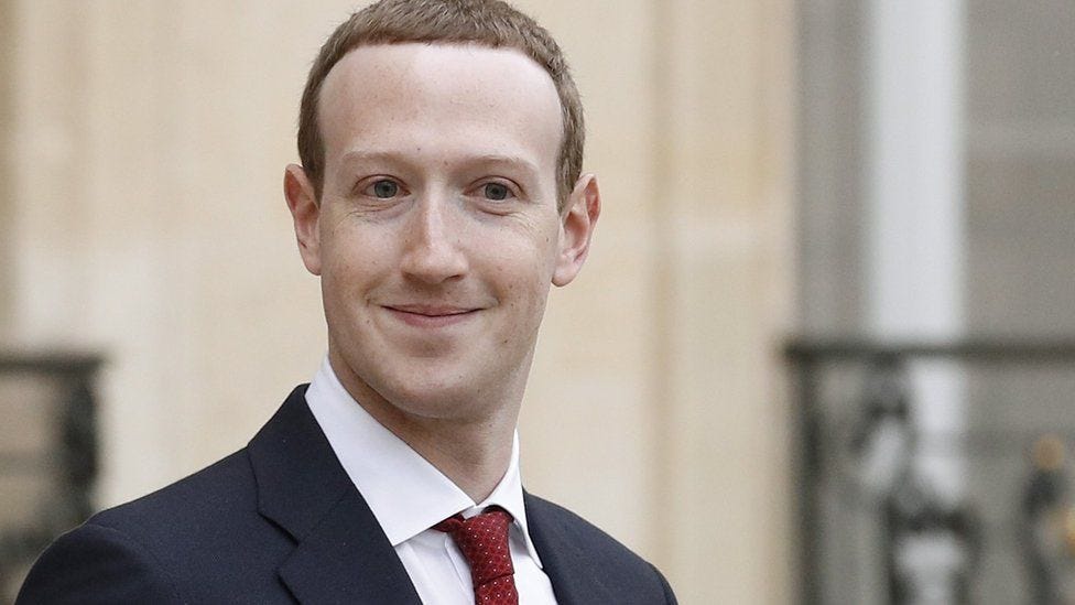 A grinning Mark Zuckerberg