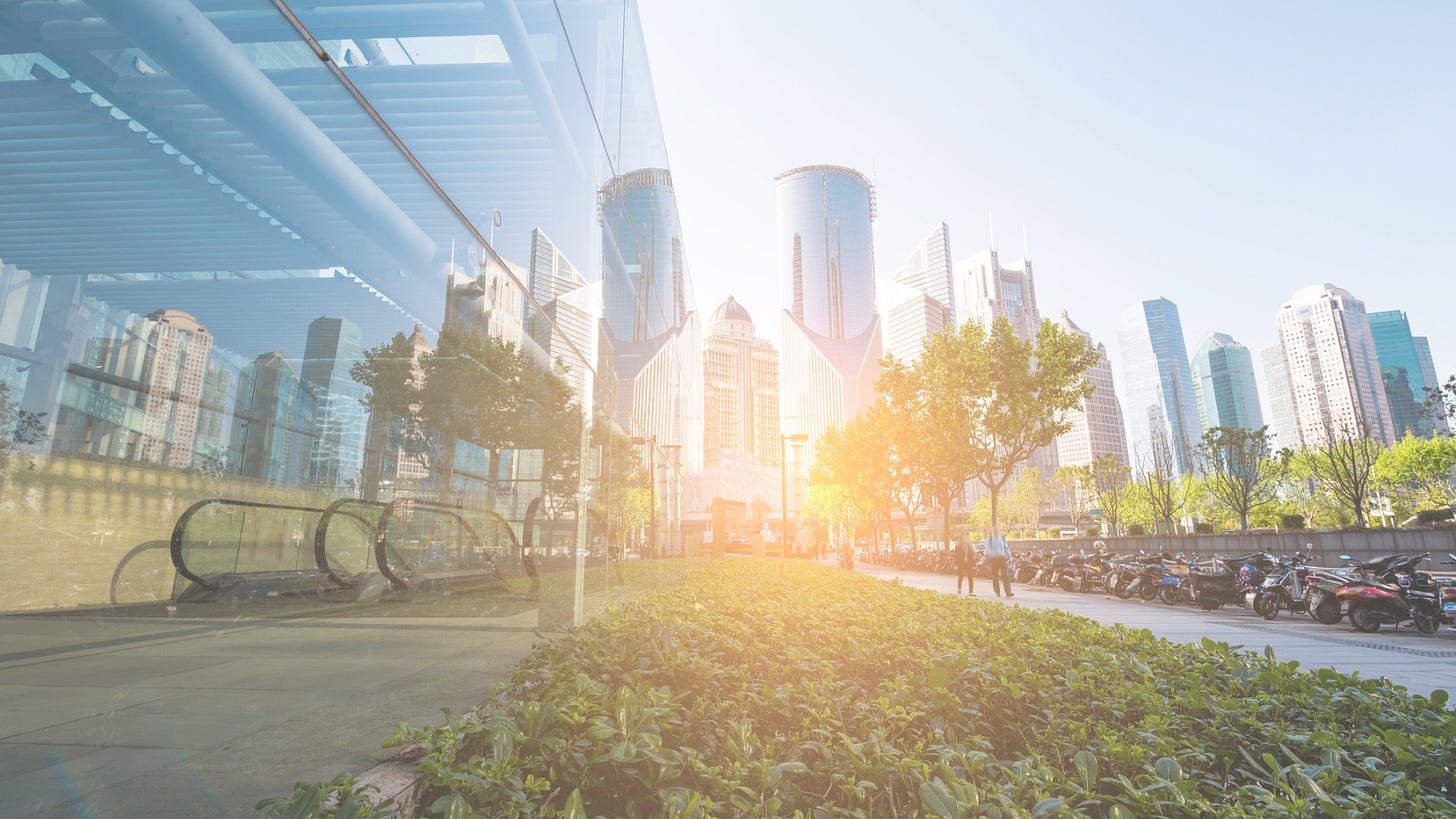 Plants and trees in the middle of good architectural buildings