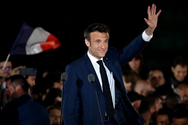 Macron looking triumphant