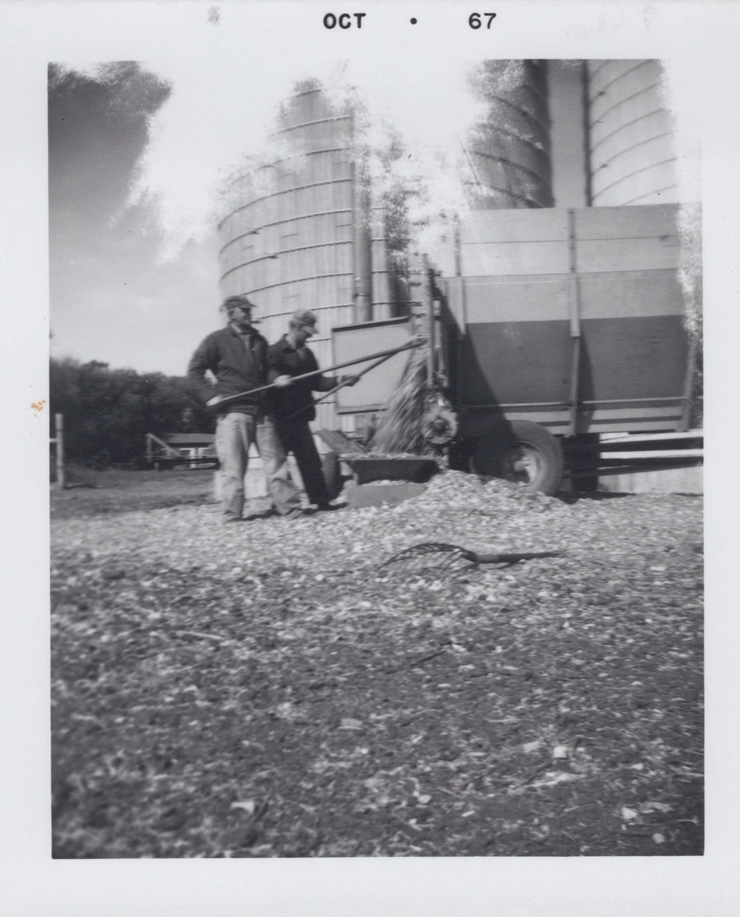 1967_Fall_Orrin Magadanz y dad filling silo_0001.jpg